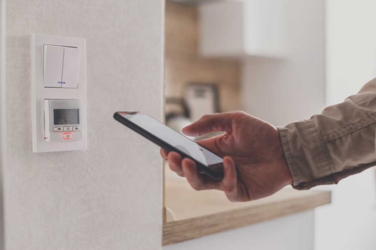 smartphone-connecting-to-floor-heating-controller--Does-a-Smart-Sensor-Light-Need-a-Switch